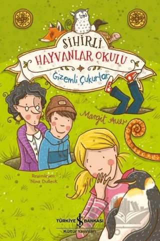 Sihirli Hayvanlar Okulu - Gizemli Çukurlar – Margit Auer – İş Bankası Kültür Yayınları kitap kapağı