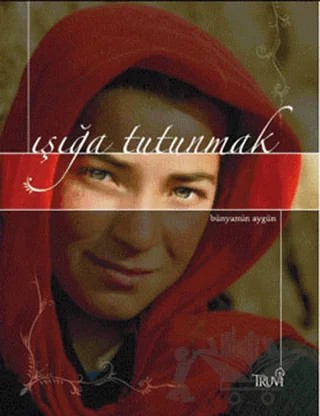 Işığa Tutunmak – Bünyamin Aygün – Truva Yayınları kitap kapağı
