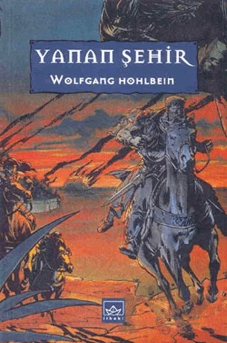 Yanan Şehir – Wolfgang Hohlbein – İthaki Yayınları kitap kapağı