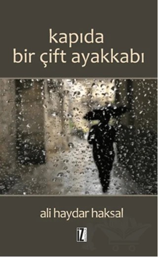 Kapıda Bir Çift Ayakkabı – Ali Haydar Haksal – İz Yayıncılık kitap kapağı